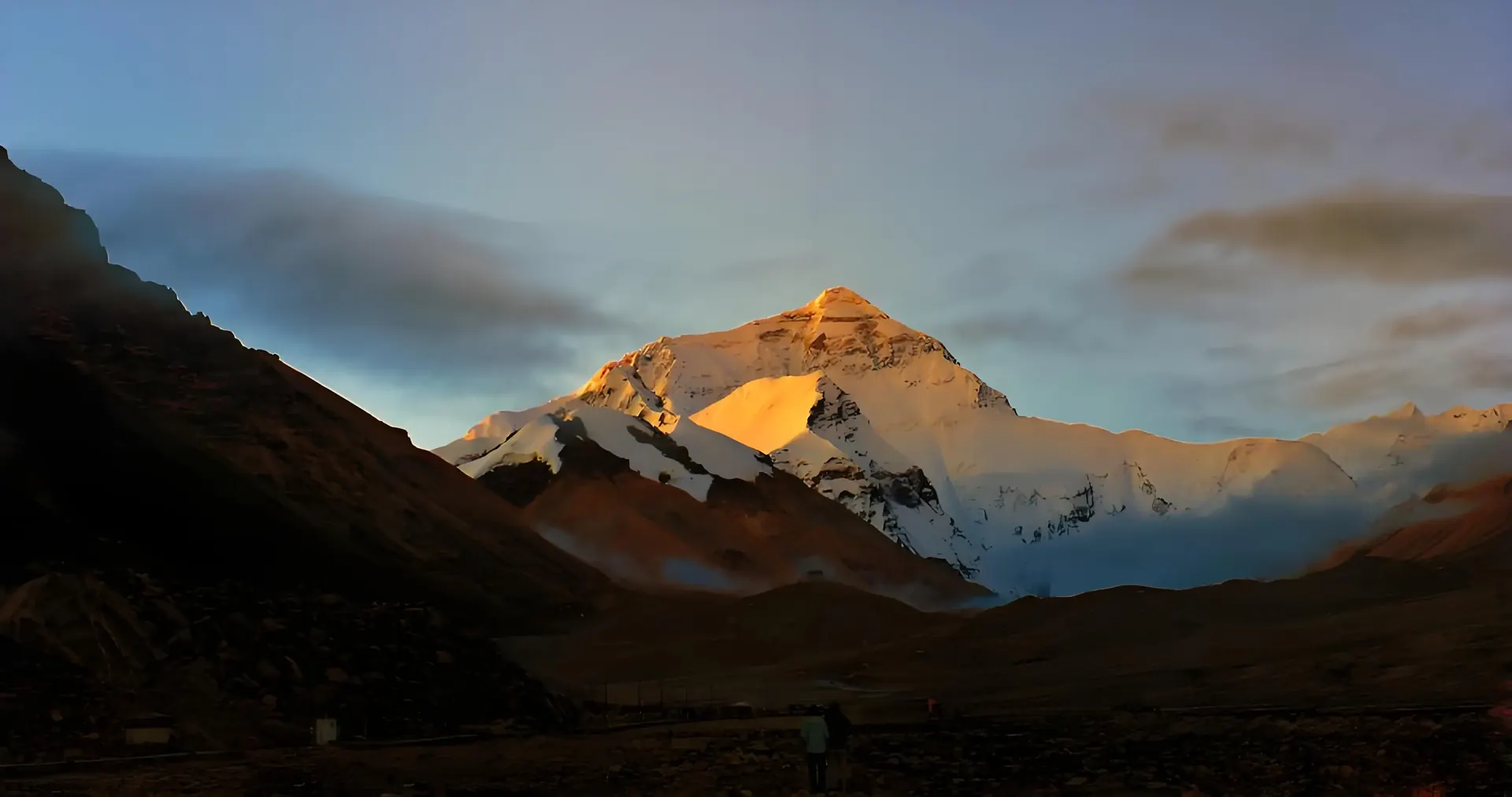 The north face of Mount Everest at dusk, seen from Rongbuk