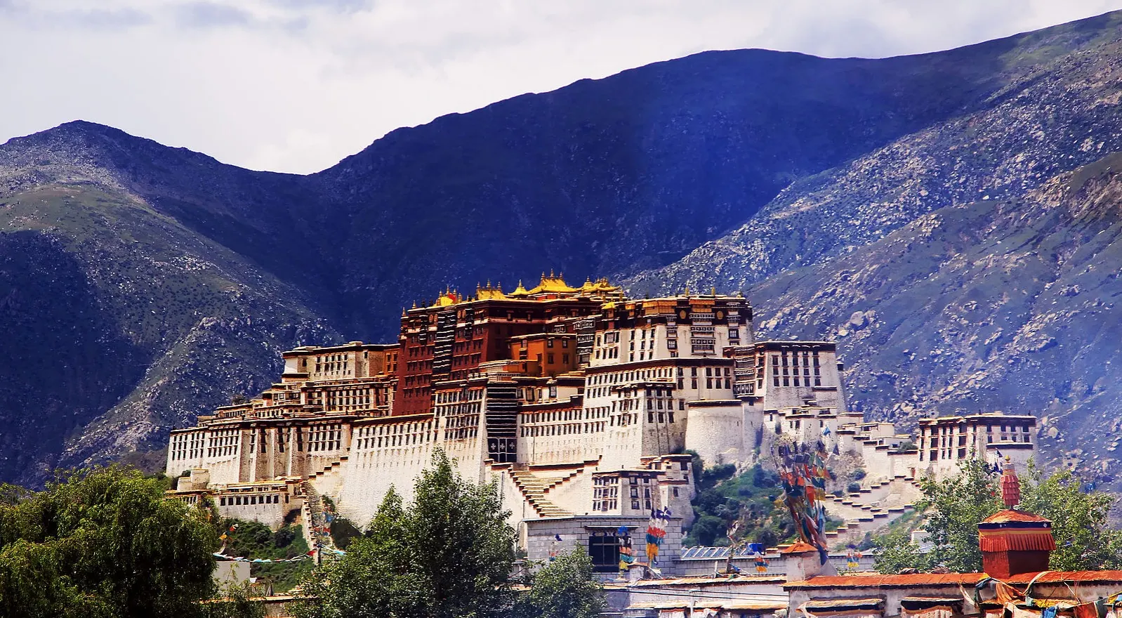 The Potala Palace in Lhasa with mountains behind